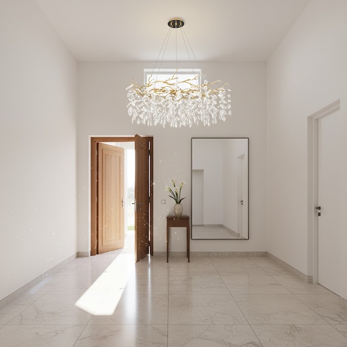 Modern entryway featuring a sculptural crystal pendant light for a grand first impression.
