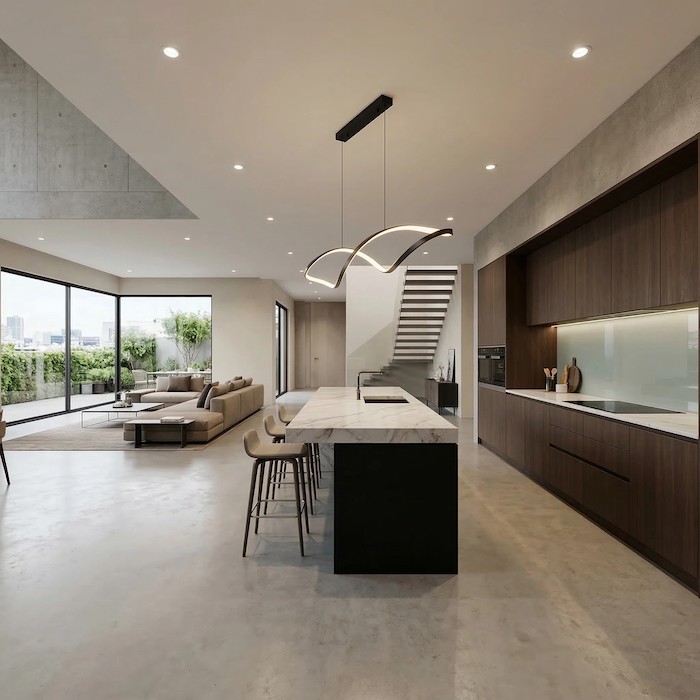 Defining kitchen zones using linear lighting in an open-plan home.