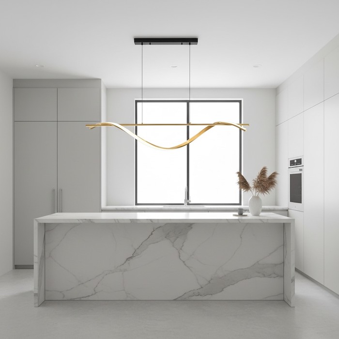 Minimalist linear lighting over a modern marble kitchen island.