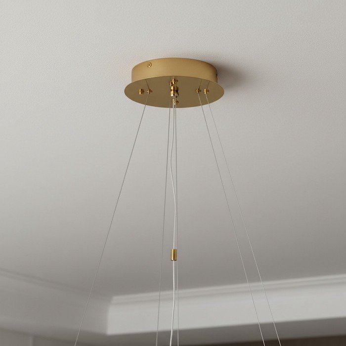 Detail of the adjustable suspension system for a luxury ring chandelier.