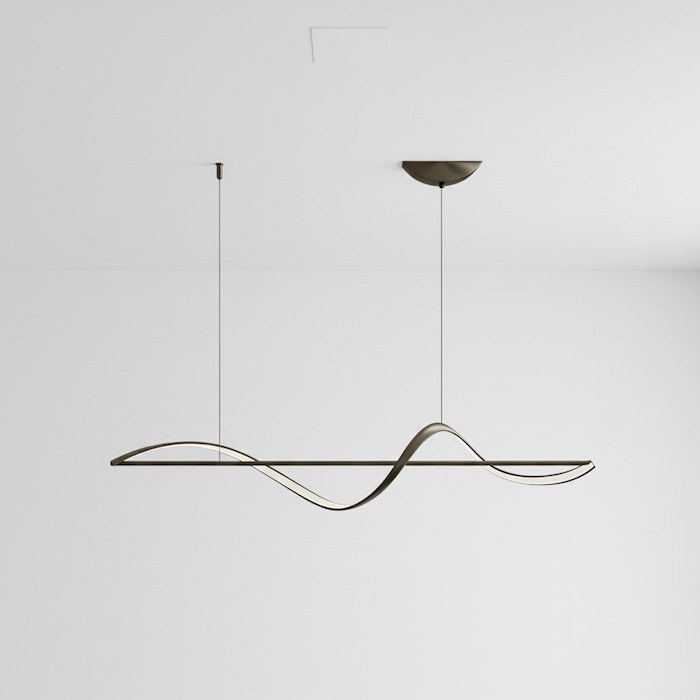 Single-point installation of a long linear chandelier on a white ceiling.