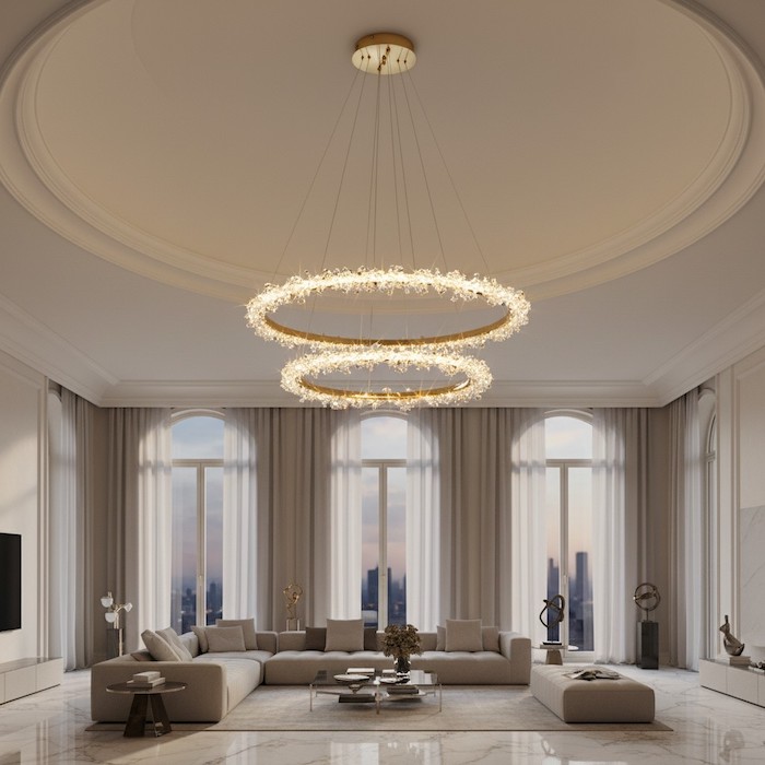 Multi-ring crystal chandelier arranged in a dramatic spiral for high-ceiling impact.