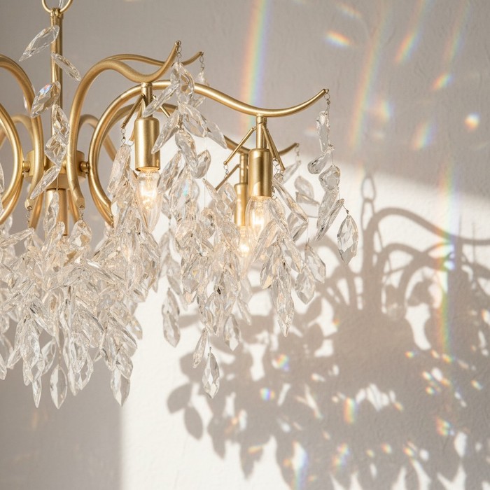 Close-up of light refraction through high-quality chandelier crystals.