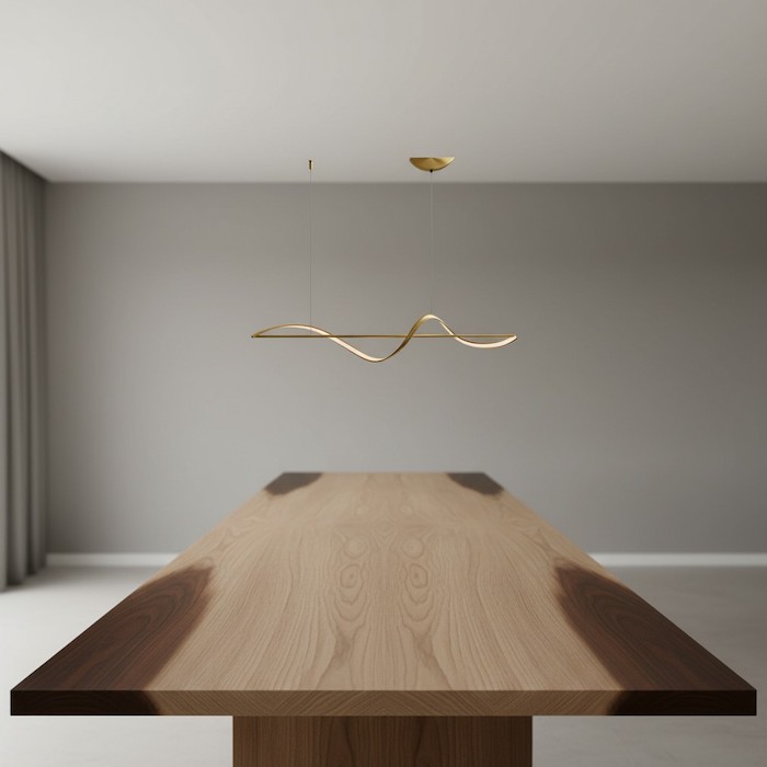 Example of a common lighting mistake where the linear fixture is too small for the table.