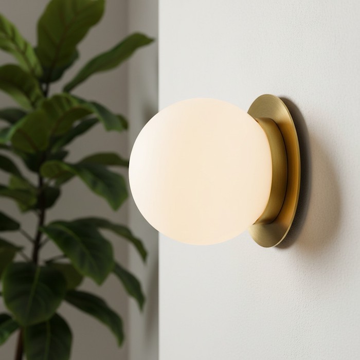 Sculptural globe wall light as a piece of architectural wall art.