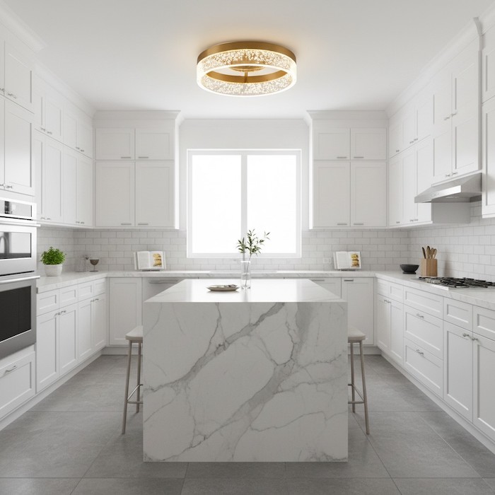 Clean kitchen design with round LED ceiling light.