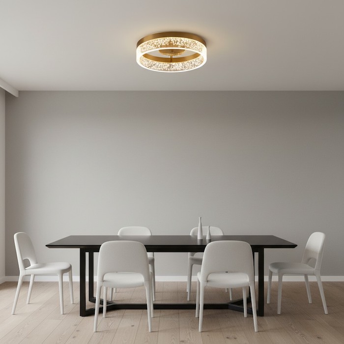 Modern dining area with round geometric lighting.