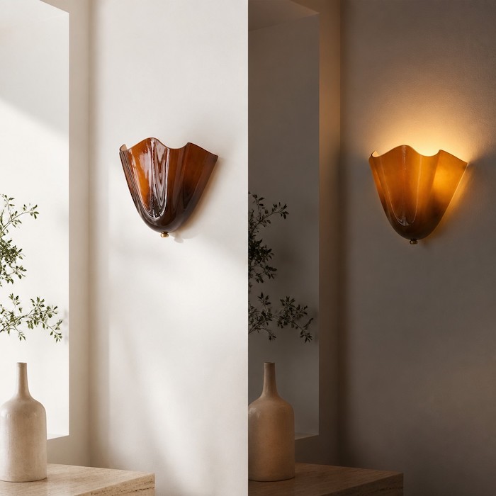 Day and night appearance of the Elia floral glass wall sconce.