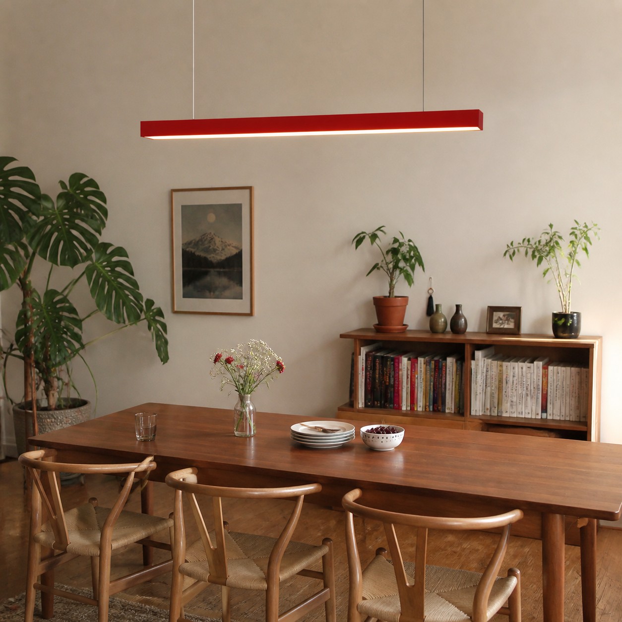 Red rectangular pendant checked against occupied dining seats and sightlines