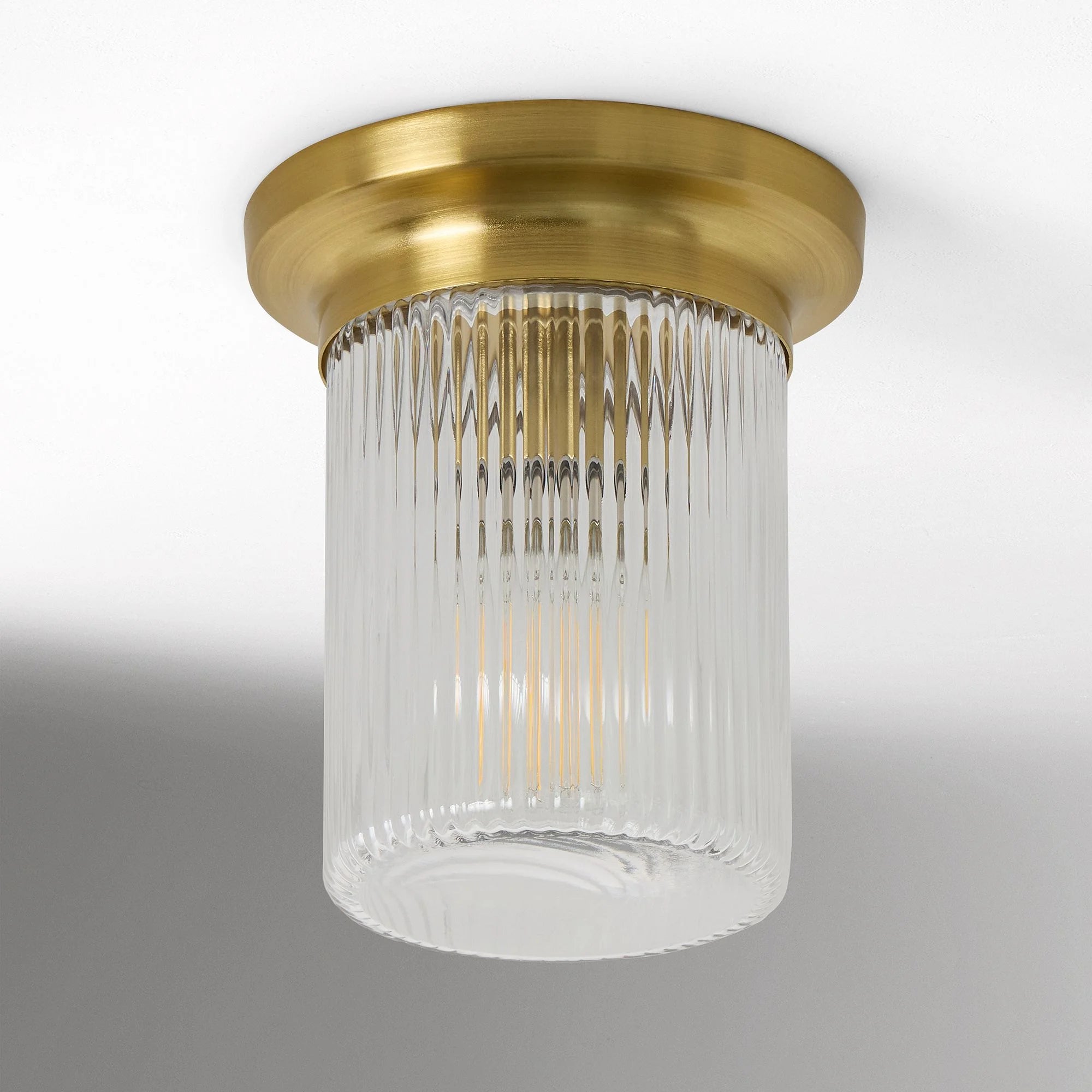 Plafonnier rond en verre nervuré moderne du milieu du siècle Galen (4).webp__PID:23a29752-c45a-4cf4-abc8-76852f0d3402