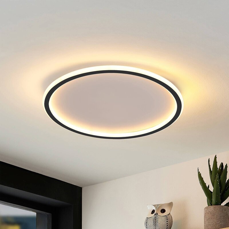 Zev Round Hollow Deckenleuchte schwarz Livingroom2.jpg__PID:2487a2a7-2b38-4339-a2eb-d7e59acc6cf2