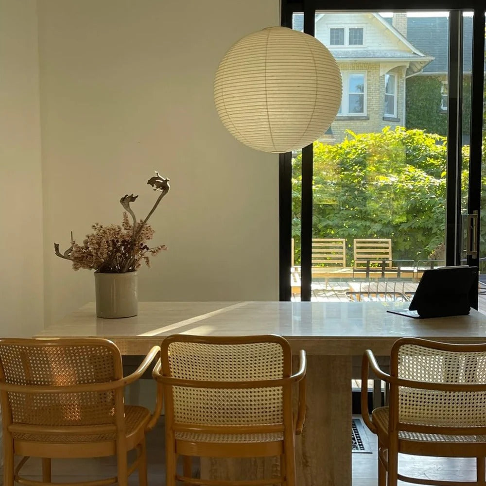 Aiko Minimalist Ribbed Paper Globe Pendant Light scene9.webp__PID:a3cb8be7-120a-4921-a744-e6b507ebdb52