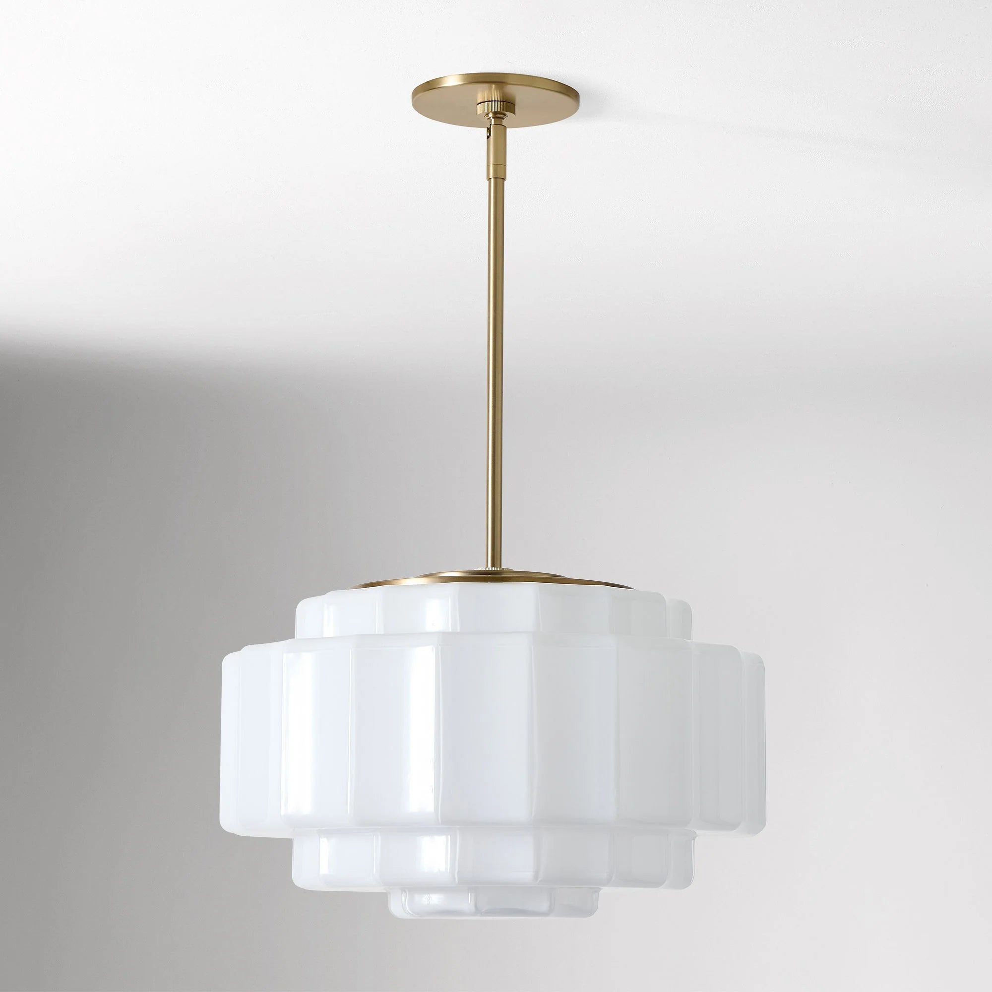 Antique_Brass_Tiered_Milk_Glass_Pendant_Light_12.webp__PID:72f55703-015f-40ad-a50d-41816942d0de