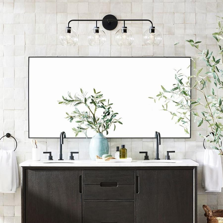 Kaia Modern Globe Glass Wall Sconce 4head scene1.webp__PID:79e9f781-370a-47f0-9489-47a974df4841