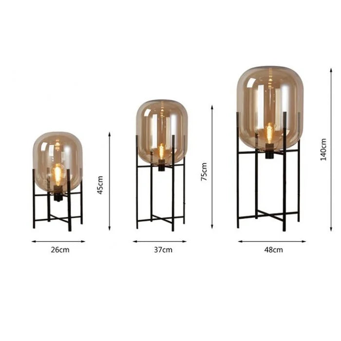 Lampada-da-terra-tavolo-in-vetro-quadrata-tonda-Typhon (10).webp__PID:11276cae-5962-41e0-a714-094cc3f6d7be