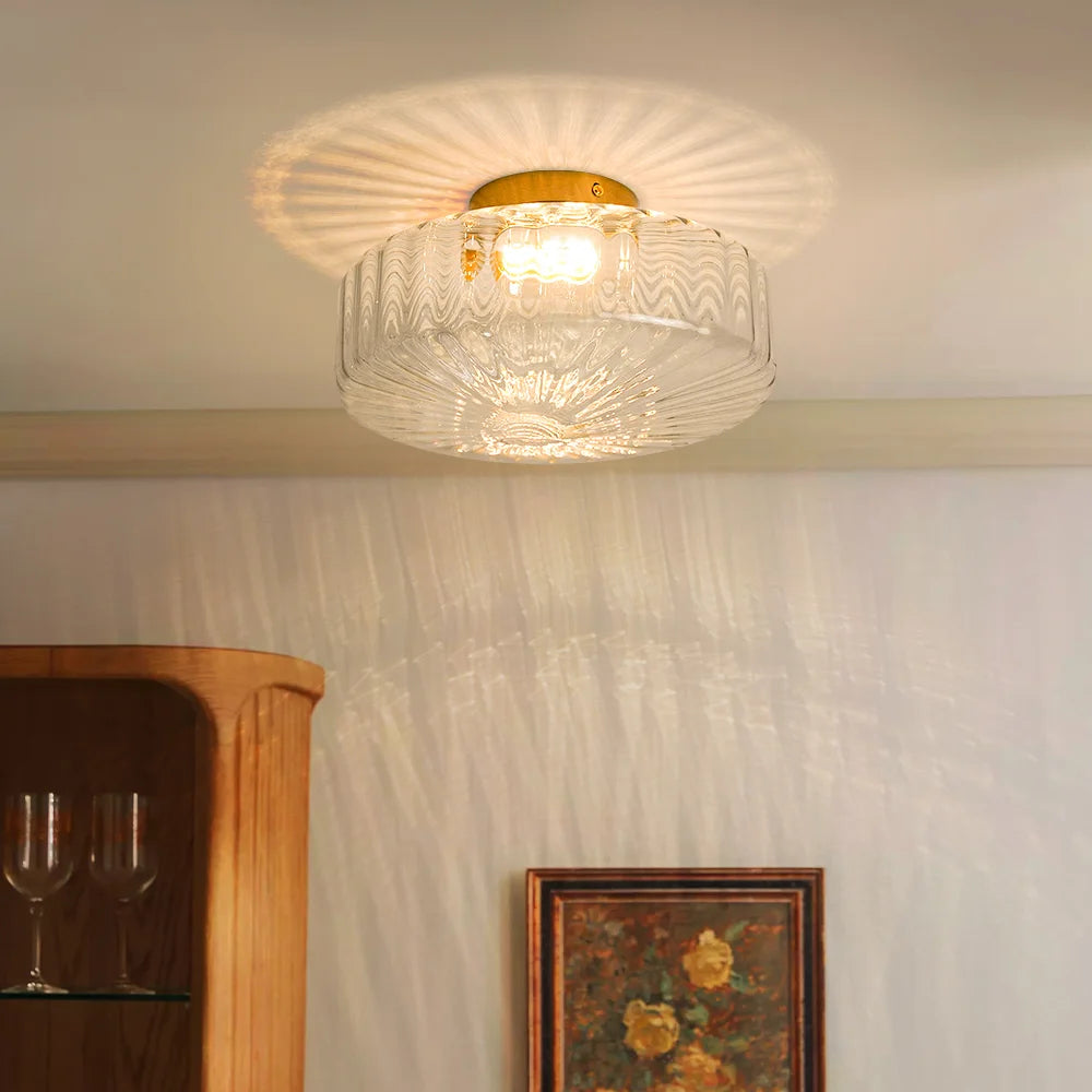 Plafonnier Rowena moderne rond en verre côtelé et laiton (1).webp__PID:131c08c0-b0d1-4e8f-ae80-3e34aa28edad