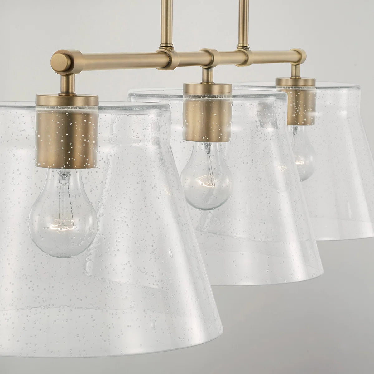 Eska Industrial 3-Light Seeded Glass Dimmable Pendant Light (2).webp__PID:674d400d-91fc-4234-8ff6-3415c272f113