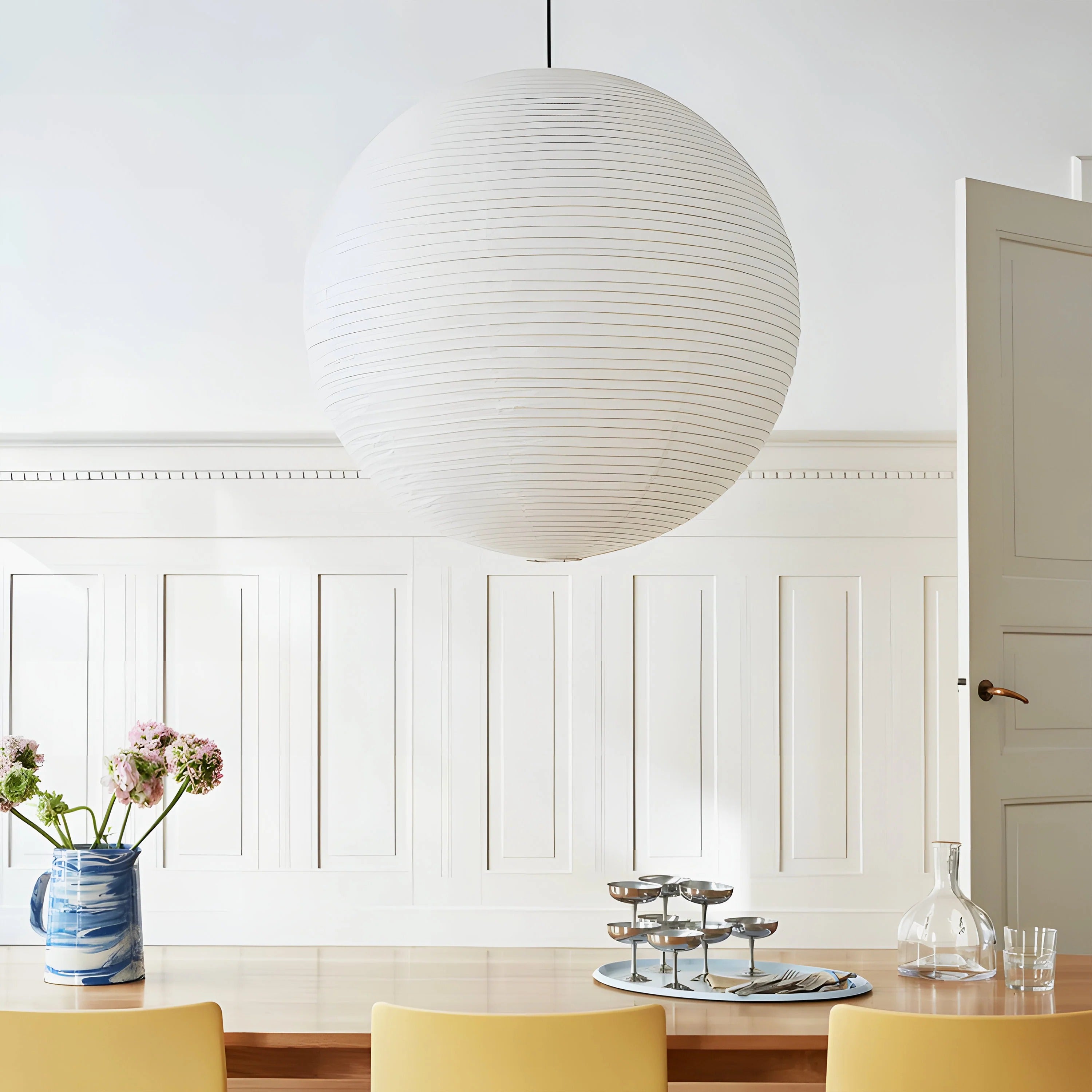 Aiko Minimalist Ribbed Paper Globe Pendant Light scene6.webp__PID:f43317a3-cb8b-4712-8a09-212744e6b507