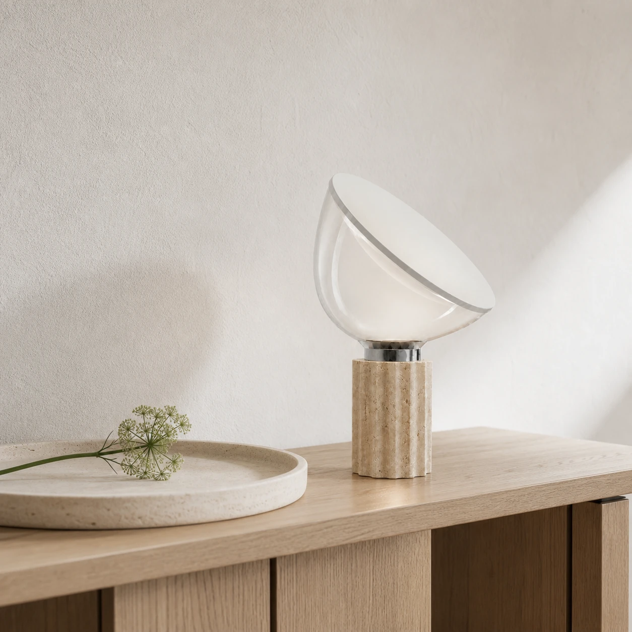 Close lifestyle view of the Taci lamp on a light oak console