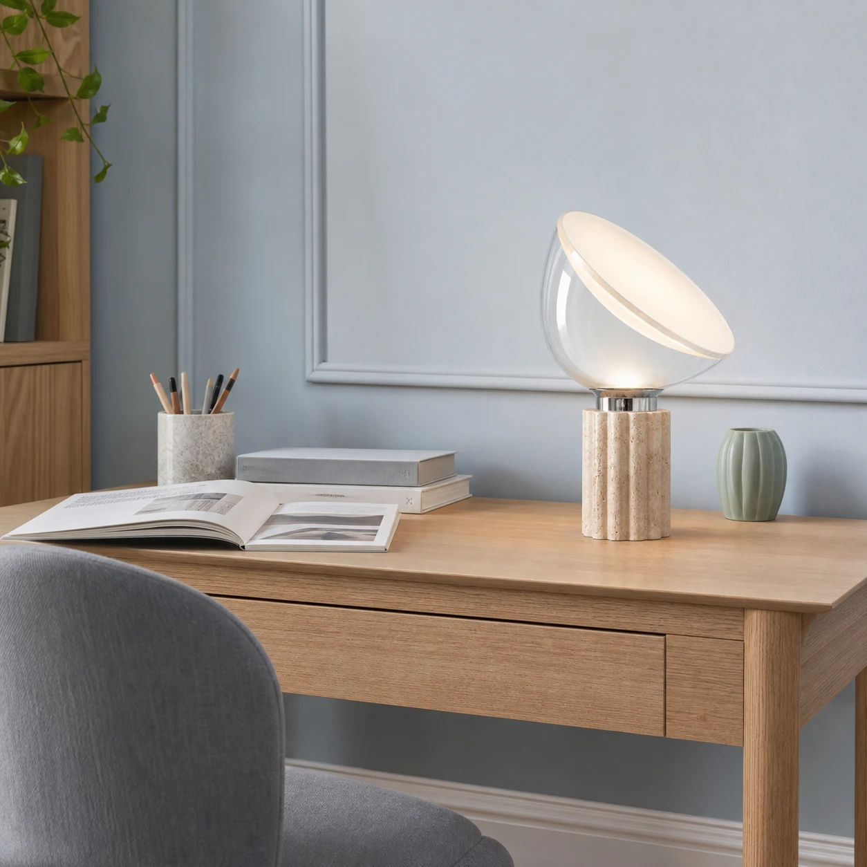 Medium lifestyle view of the Taci lamp in a Nordic home office