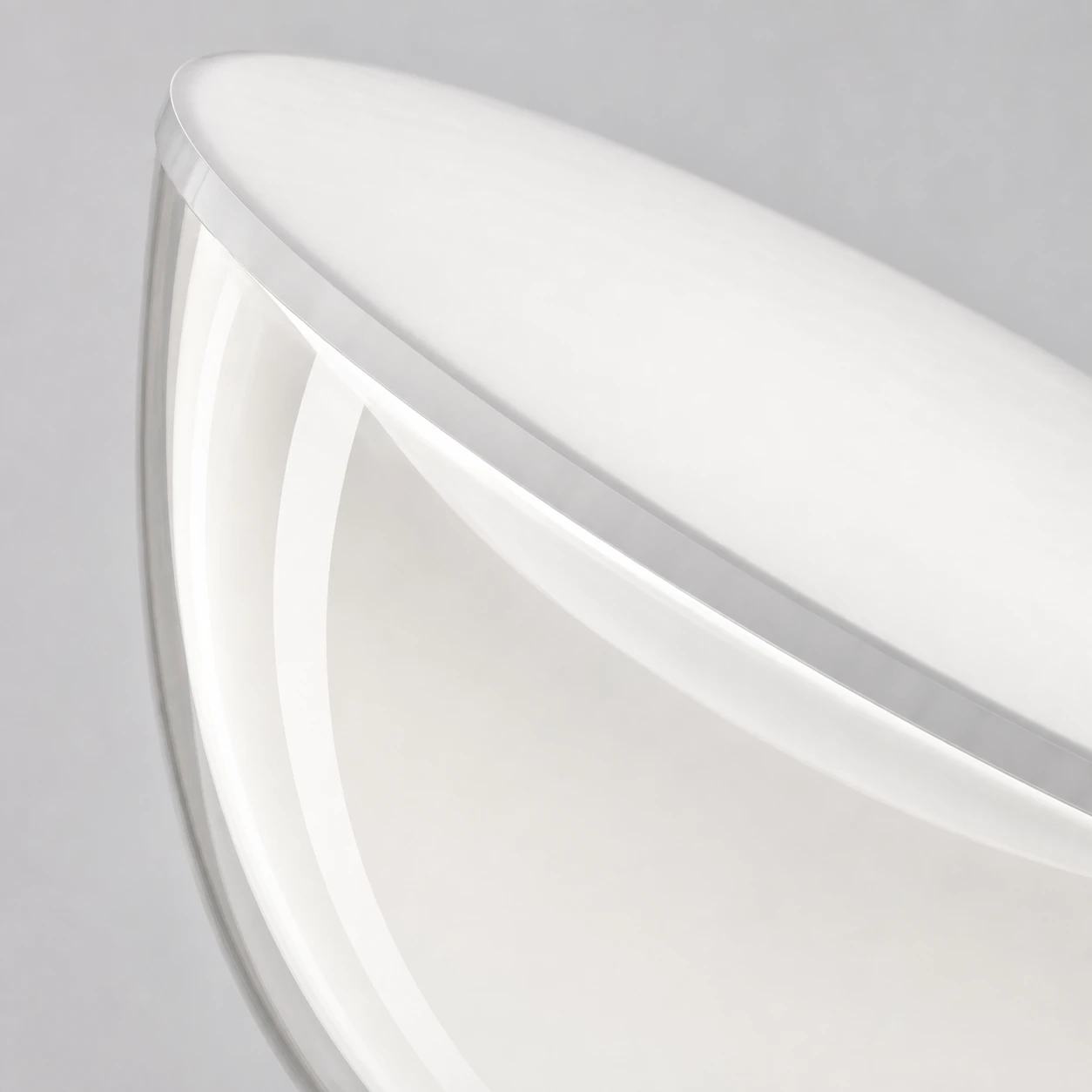 Close detail of the sculpted clear glass bowl shade