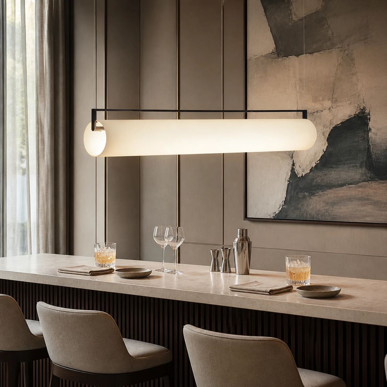 Edge cylindrical pendant above a modern boutique-hotel bar