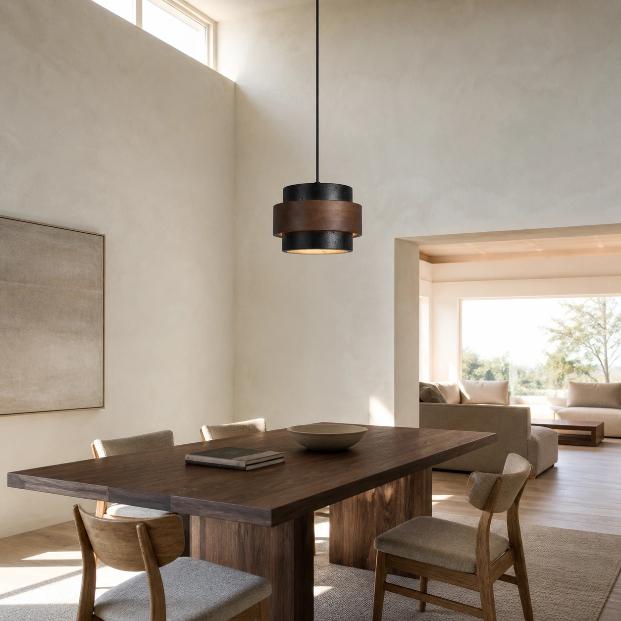 Black SKU pendant in a bright high-ceiling dining room