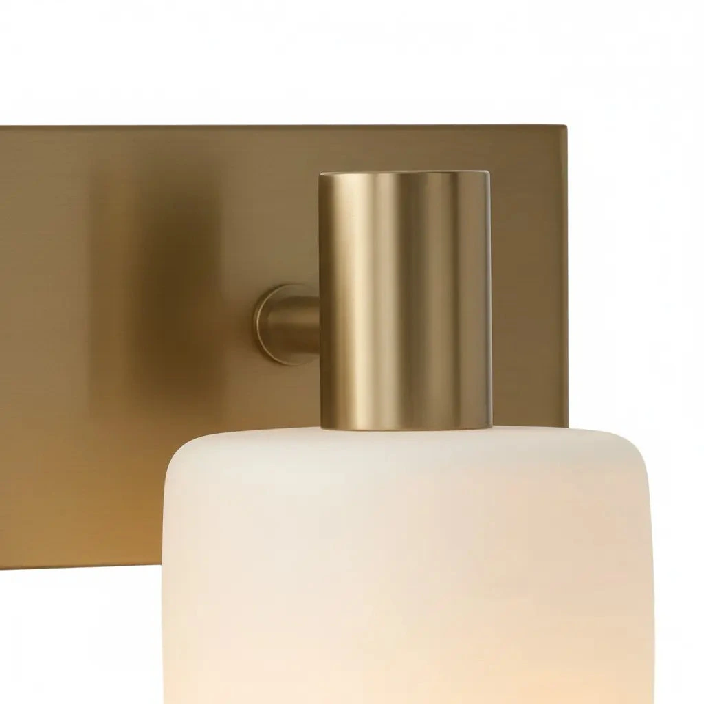 Brushed brass pivot joint and porcelain shade detail