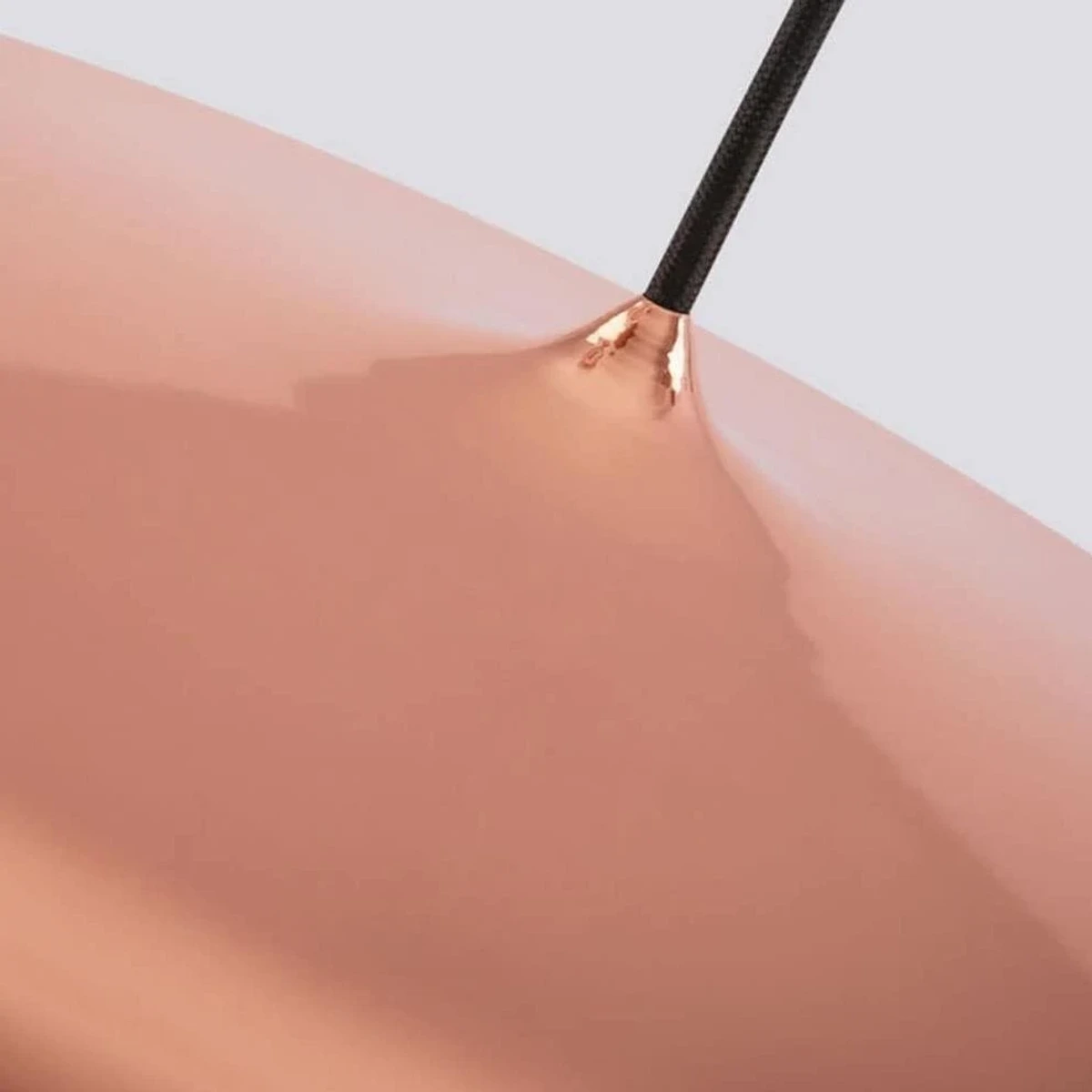 Close detail of the smooth formed metal shade