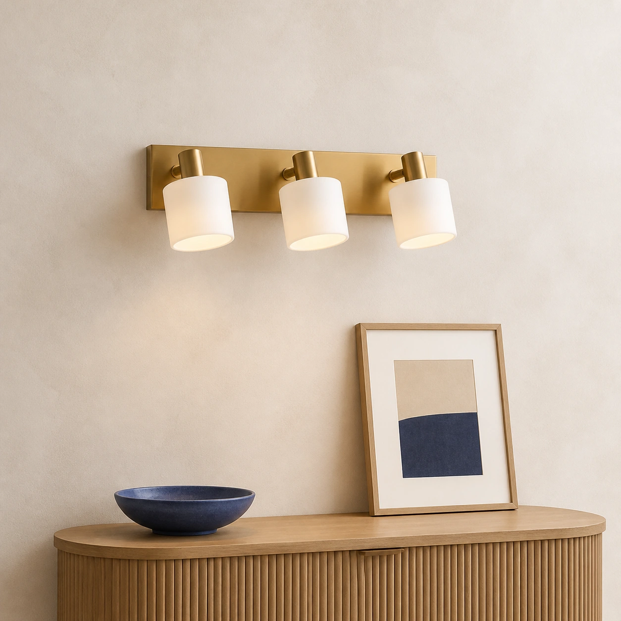 Eucrante three-light porcelain wall sconce above a Nordic oak console