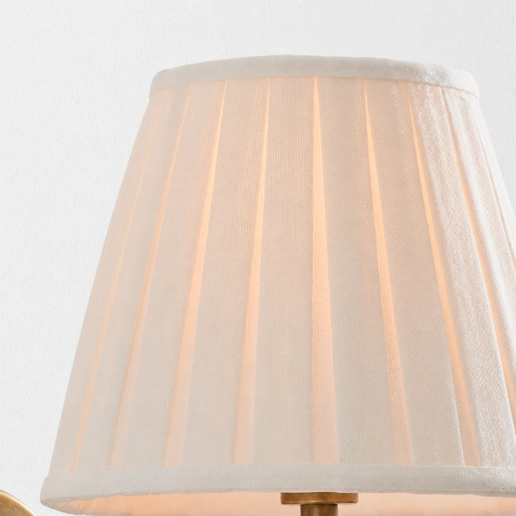 Close detail of the white pleated linen shade