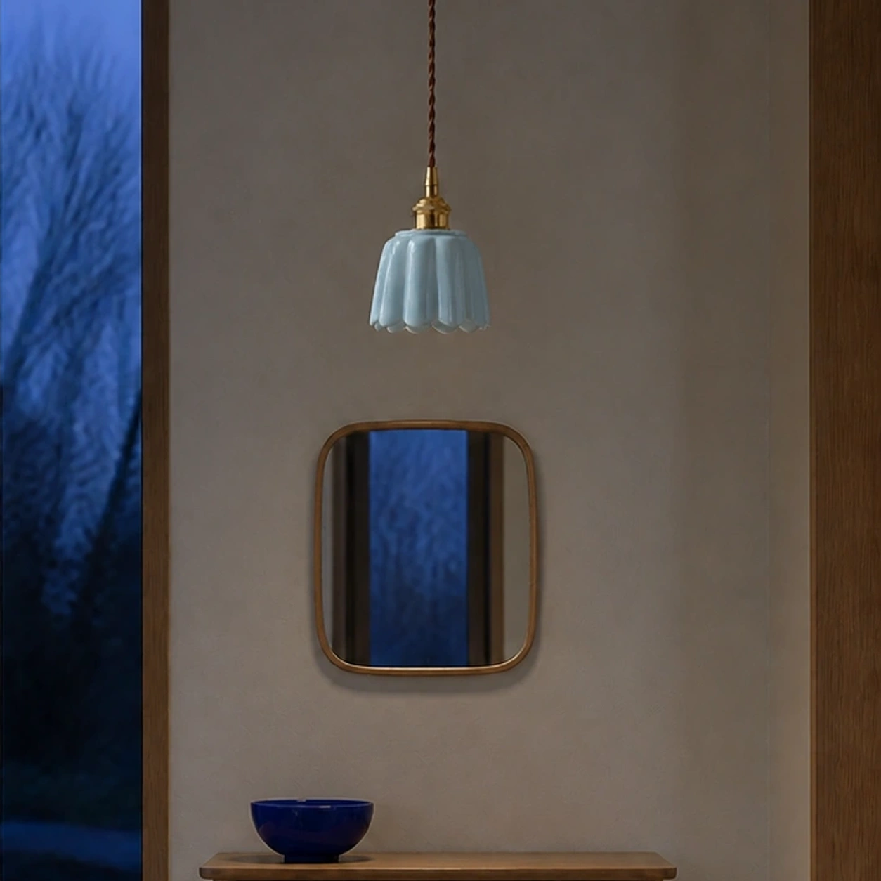 The same Blue Daphne pendant and entryway with the light switched off