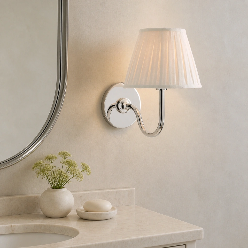 Polished Nickel Eosphine wall light above a console
