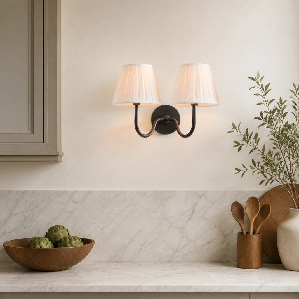 Antique Bronze two-head Eosphine wall light in a modern kitchen