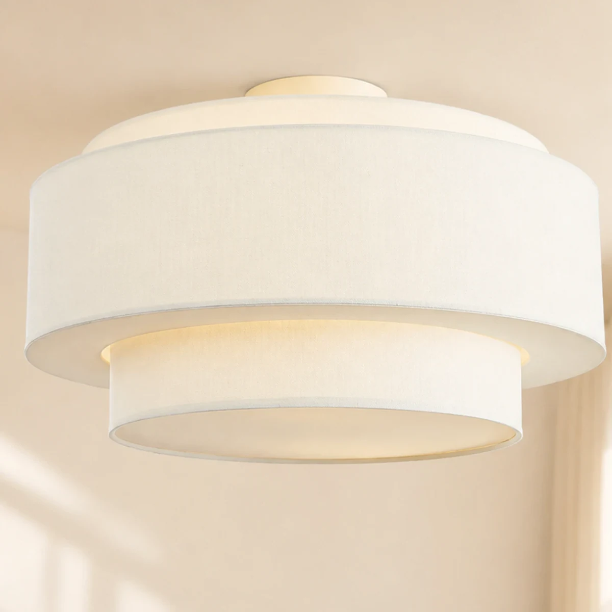 Close view of the cream white linen weave and finished shade edge