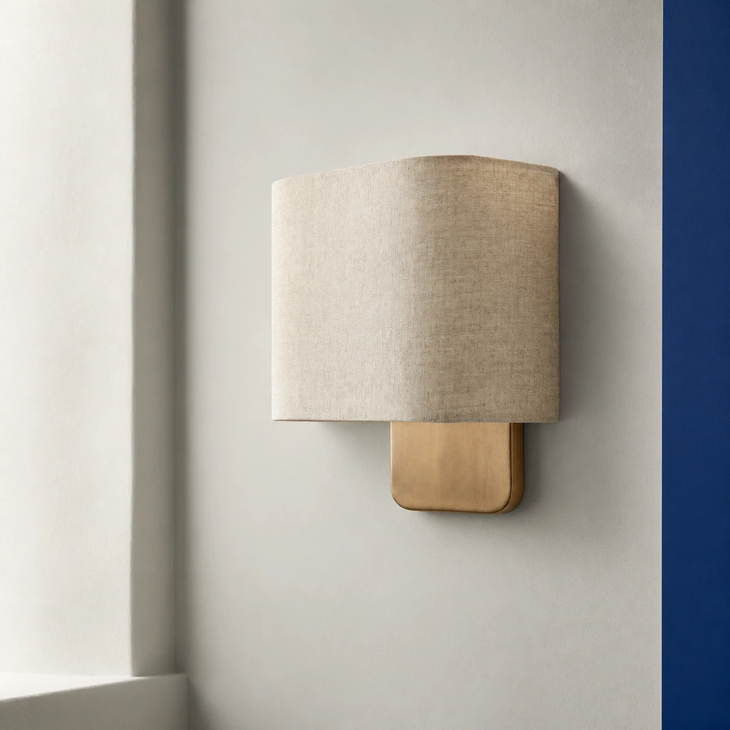 Woven shade and brushed metal detail of the Jareth wall sconce