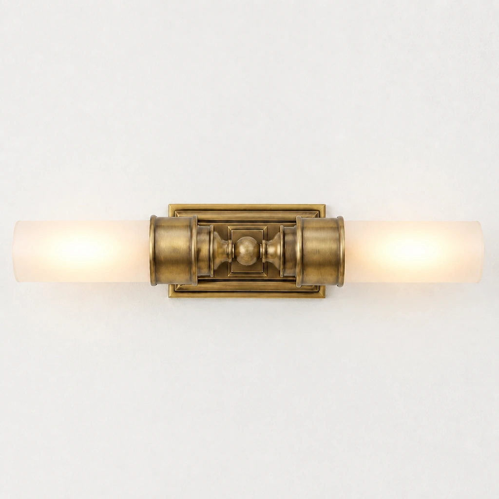 Brass finish wall light on