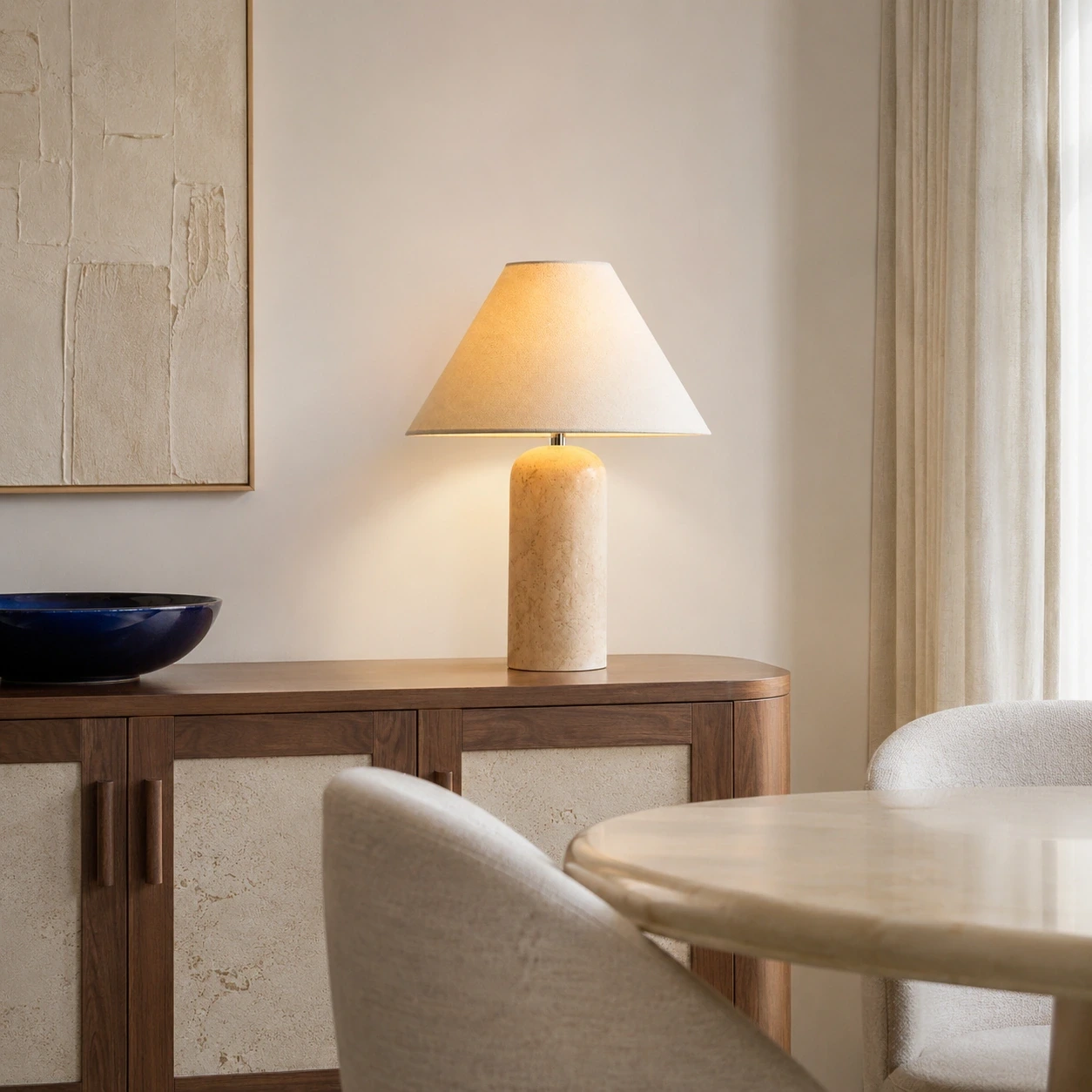 Daph travertine table lamp on a refined dining room sideboard