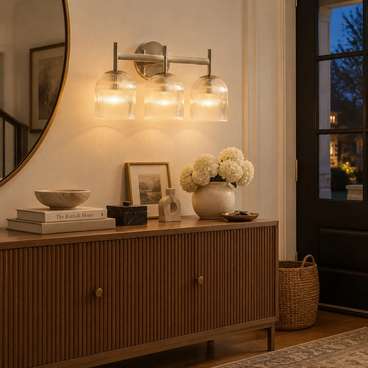 Wall light above a warm wood console