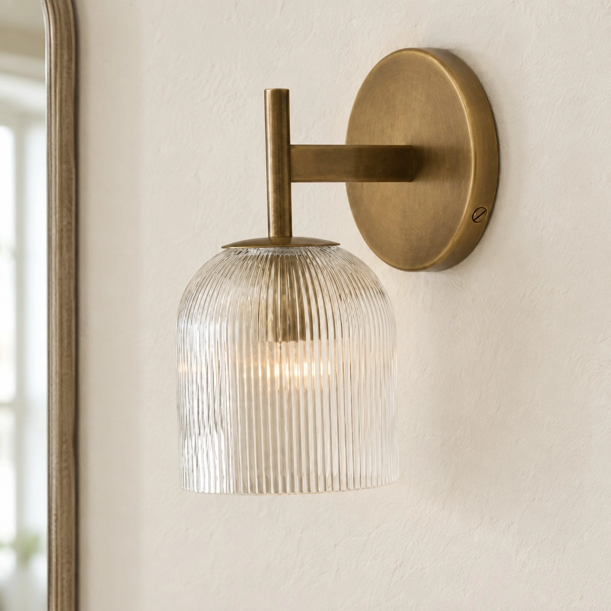 Close view of the illuminated Museia wall light