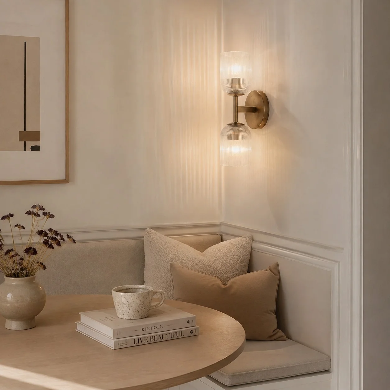 Wall light beside a softly furnished lounge chair