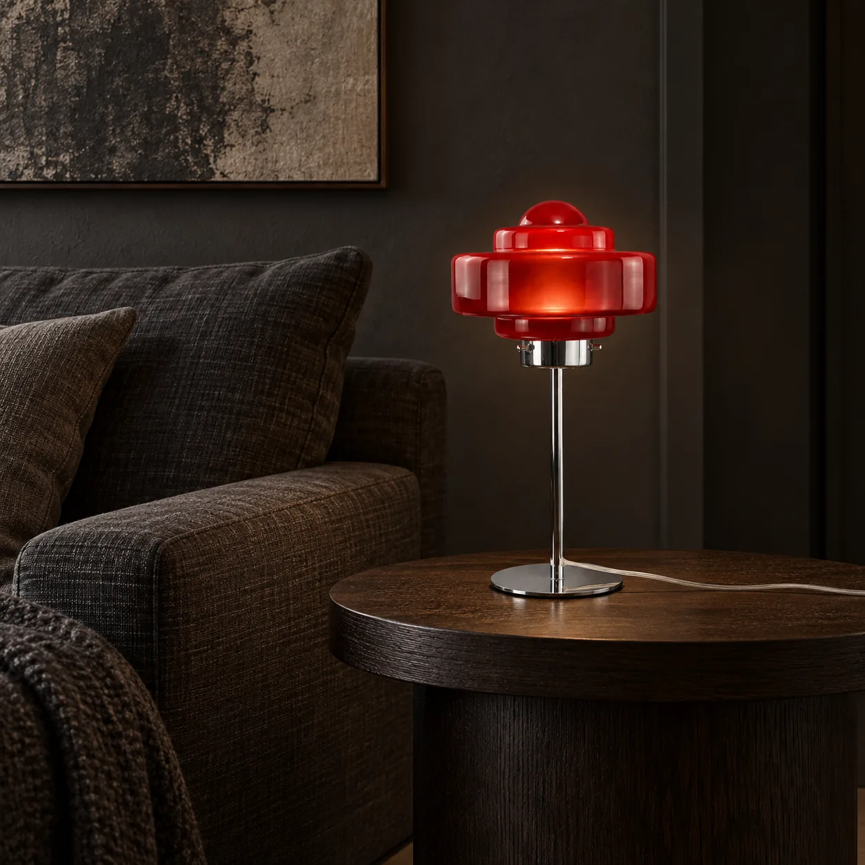 Red disc lamp in a charcoal lounge