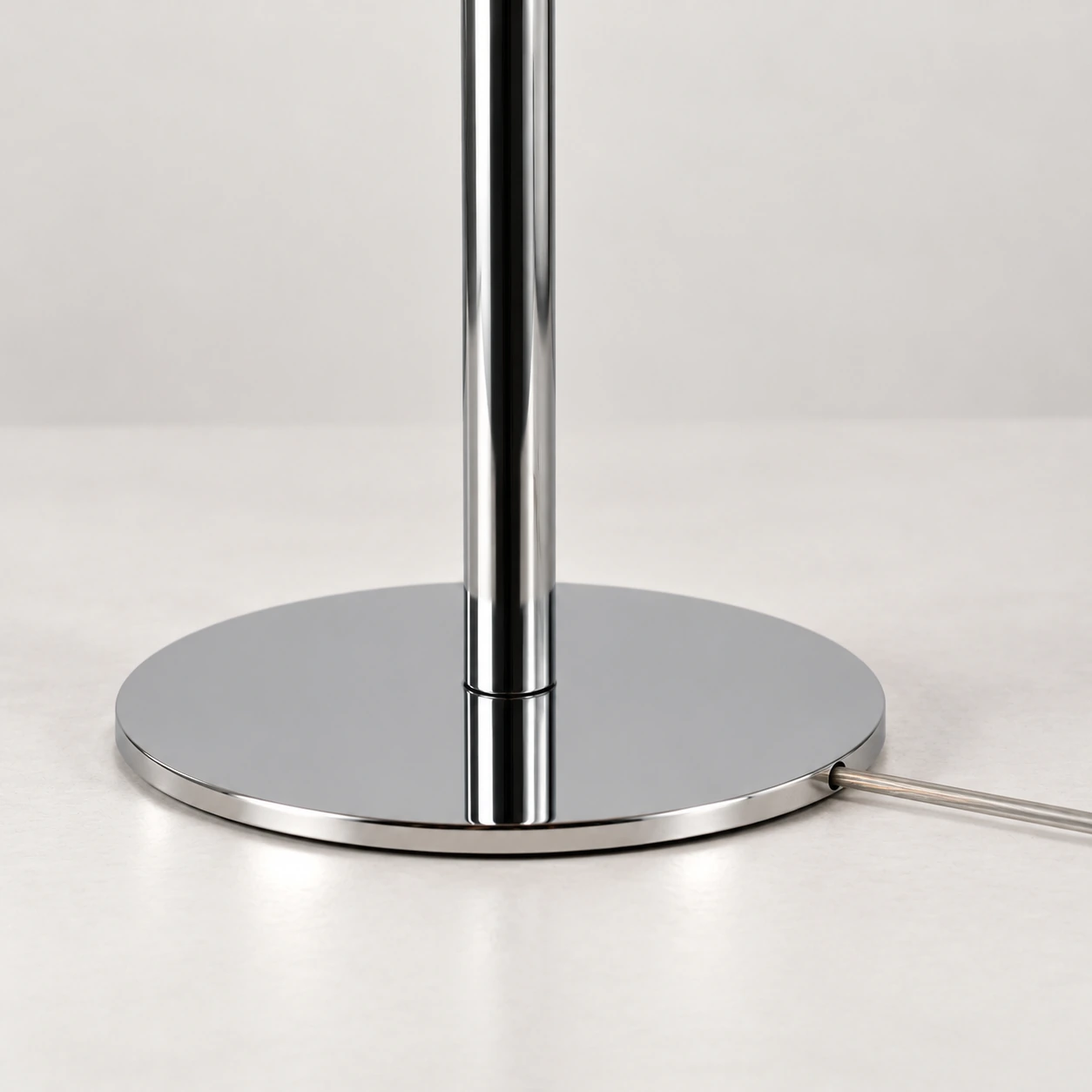 Round chrome base with side cable