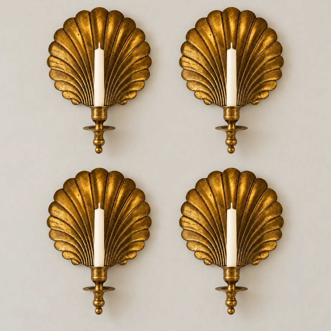 Set of four antique brass shell sconces