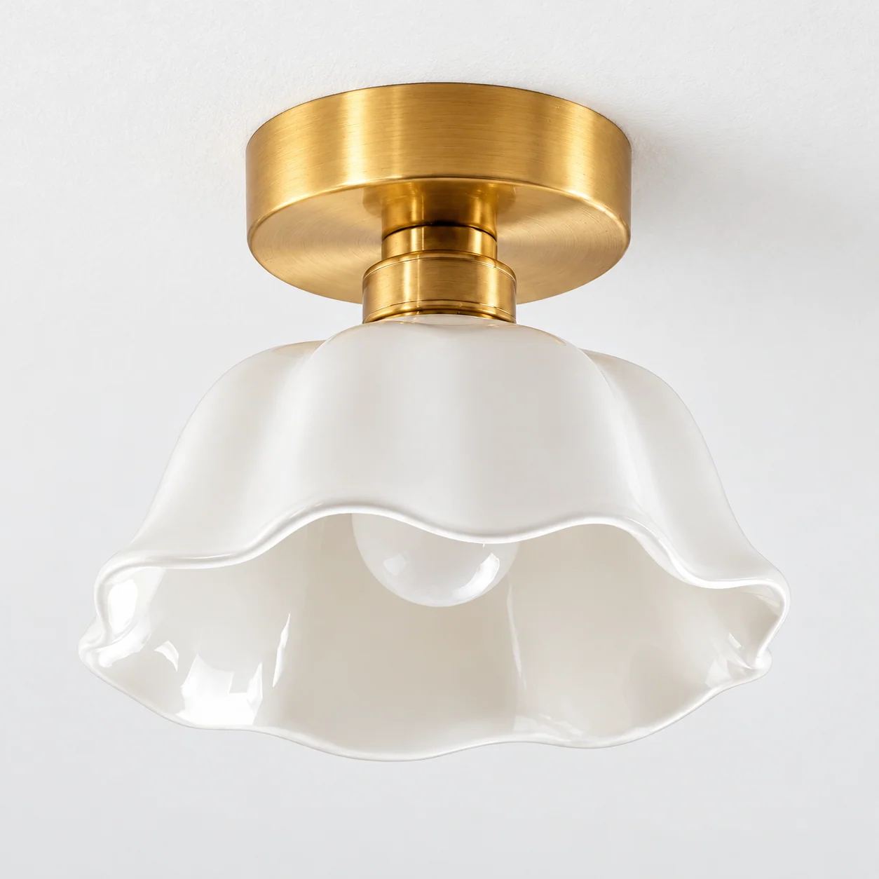 Close detail of the flush mount brass base